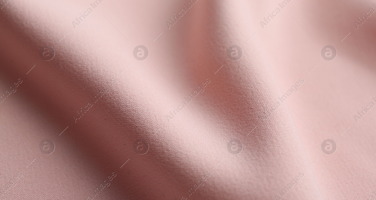 Photo of Texture of beautiful pink fabric as background, closeup