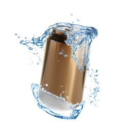 Image of Golden aluminum can with splash of water on white background