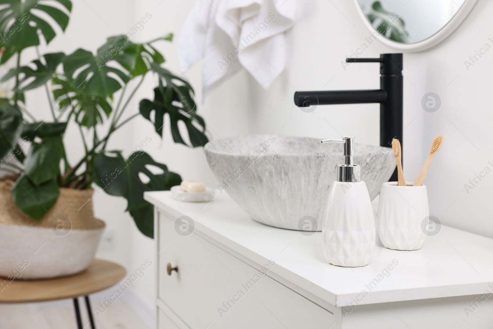 Photo of Different bath accessories and personal care products on bathroom vanity indoors, space for text