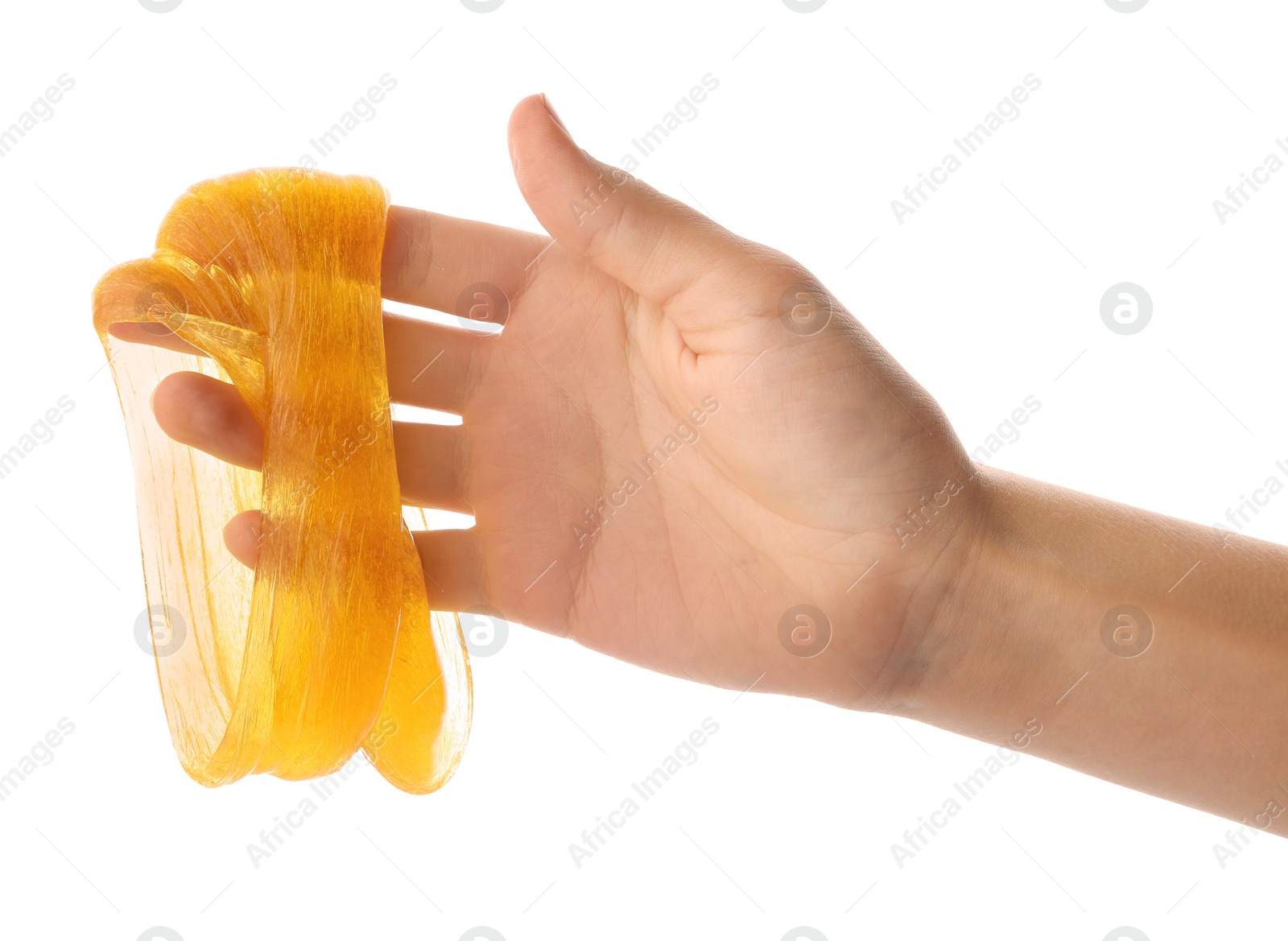 Photo of Woman playing with orange slime isolated on white, closeup. Antistress toy