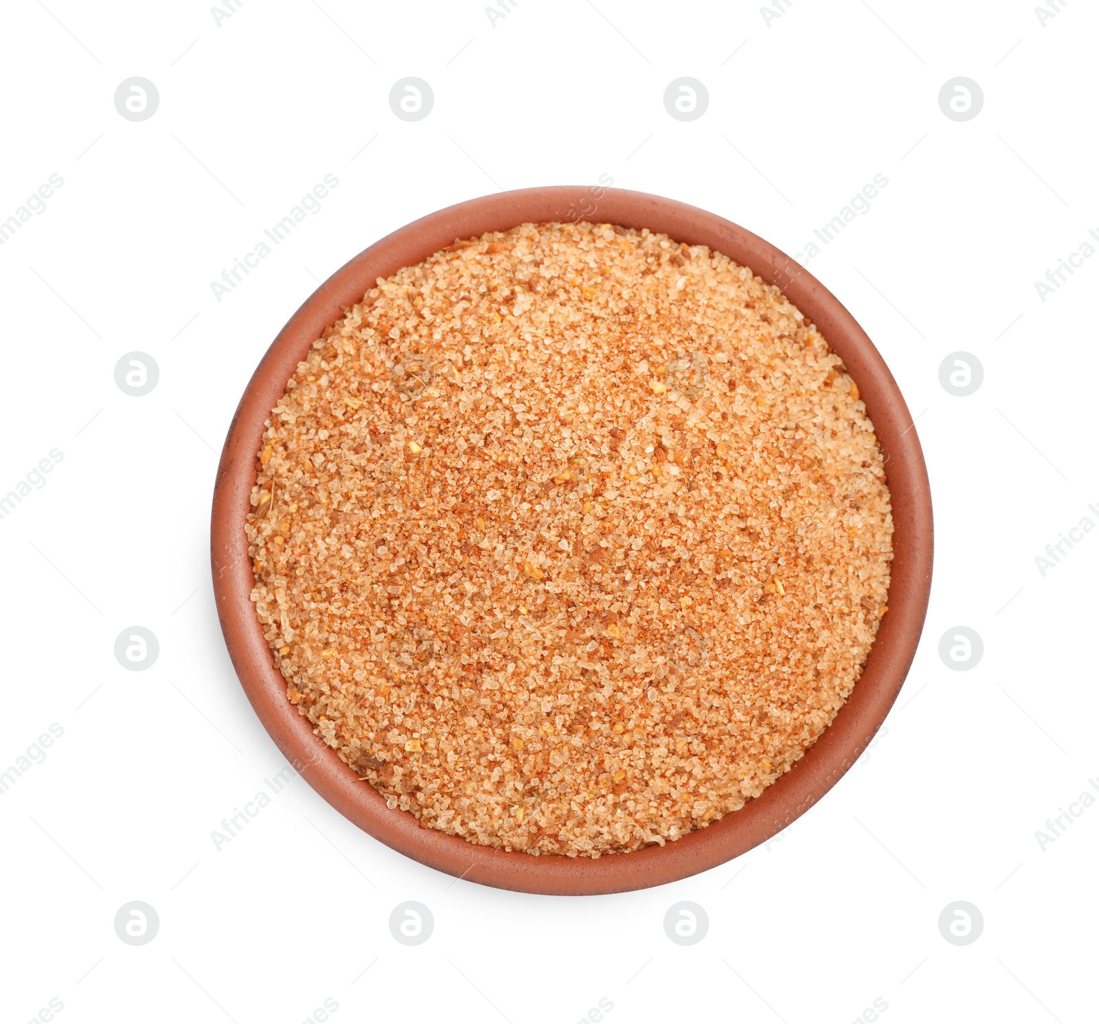 Photo of Pink salt with spices in bowl isolated on white, top view