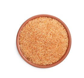 Photo of Pink salt with spices in bowl isolated on white, top view