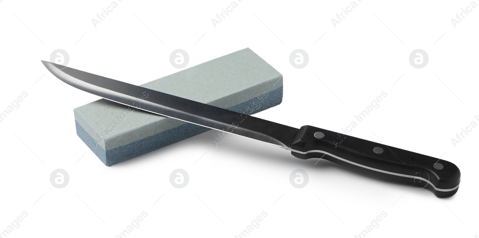 Photo of Sharp slicing knife with grindstone isolated on white