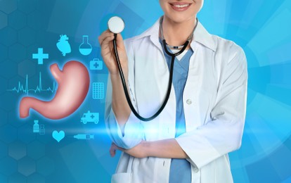 Image of Illustration of stomach and doctor with stethoscope on light blue background, closeup