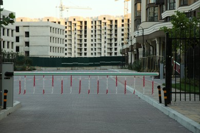 Photo of Closed automatic boom barrier on city street