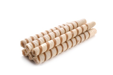 Tasty wafer roll sticks on white background. Crispy food