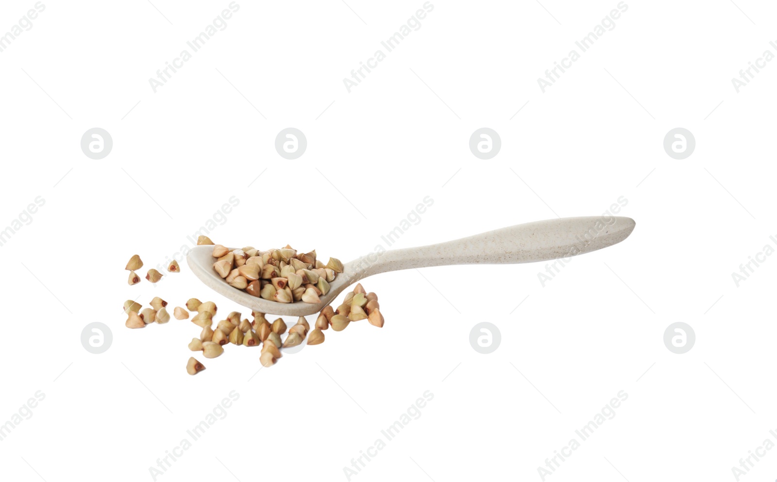 Photo of Spoon with organic green buckwheat isolated on white