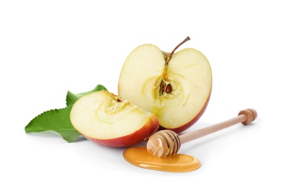 Photo of Apple, honey and dipper on white background