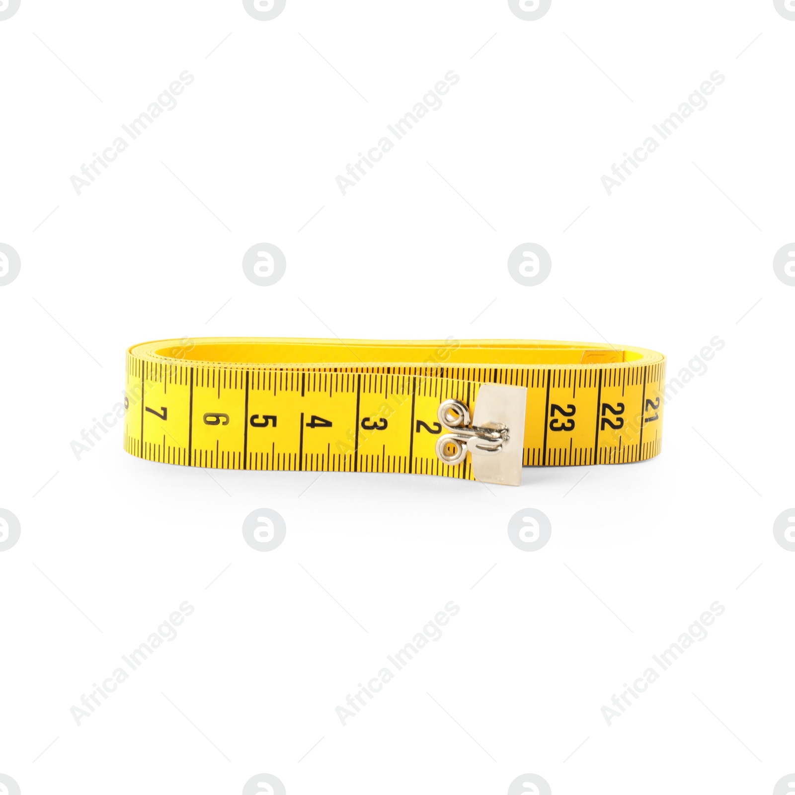 Photo of Yellow folded measuring tape isolated on white