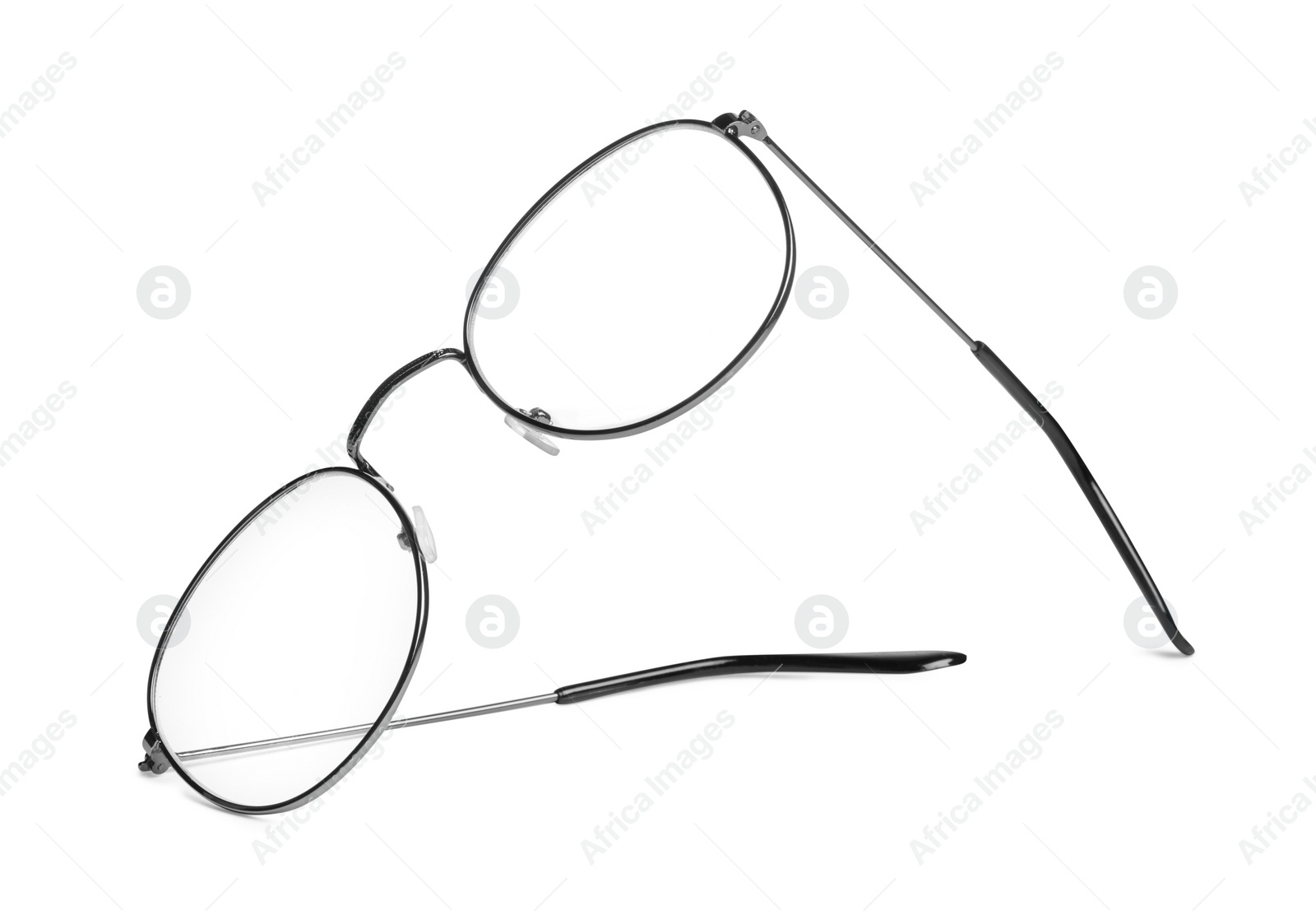 Photo of Stylish pair of glasses isolated on white