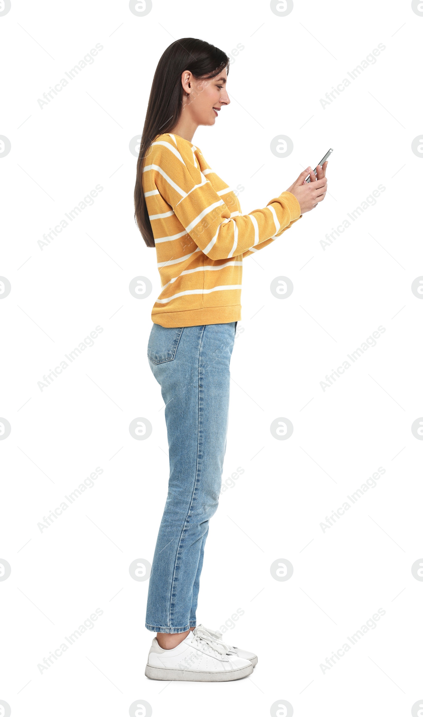 Photo of Happy woman using smartphone on white background