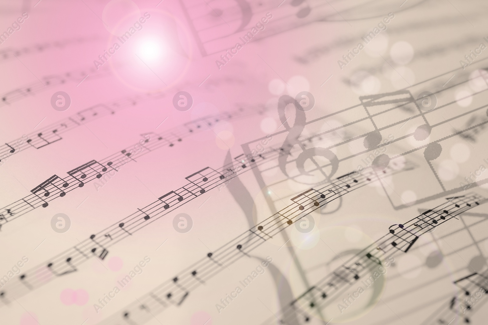 Image of Double exposure of sheets with music notes as background, closeup. Bokeh effect