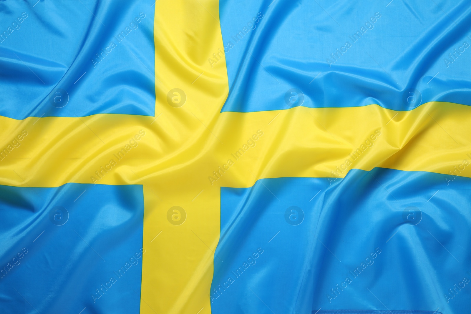 Photo of Flag of Sweden as background, top view. National symbol