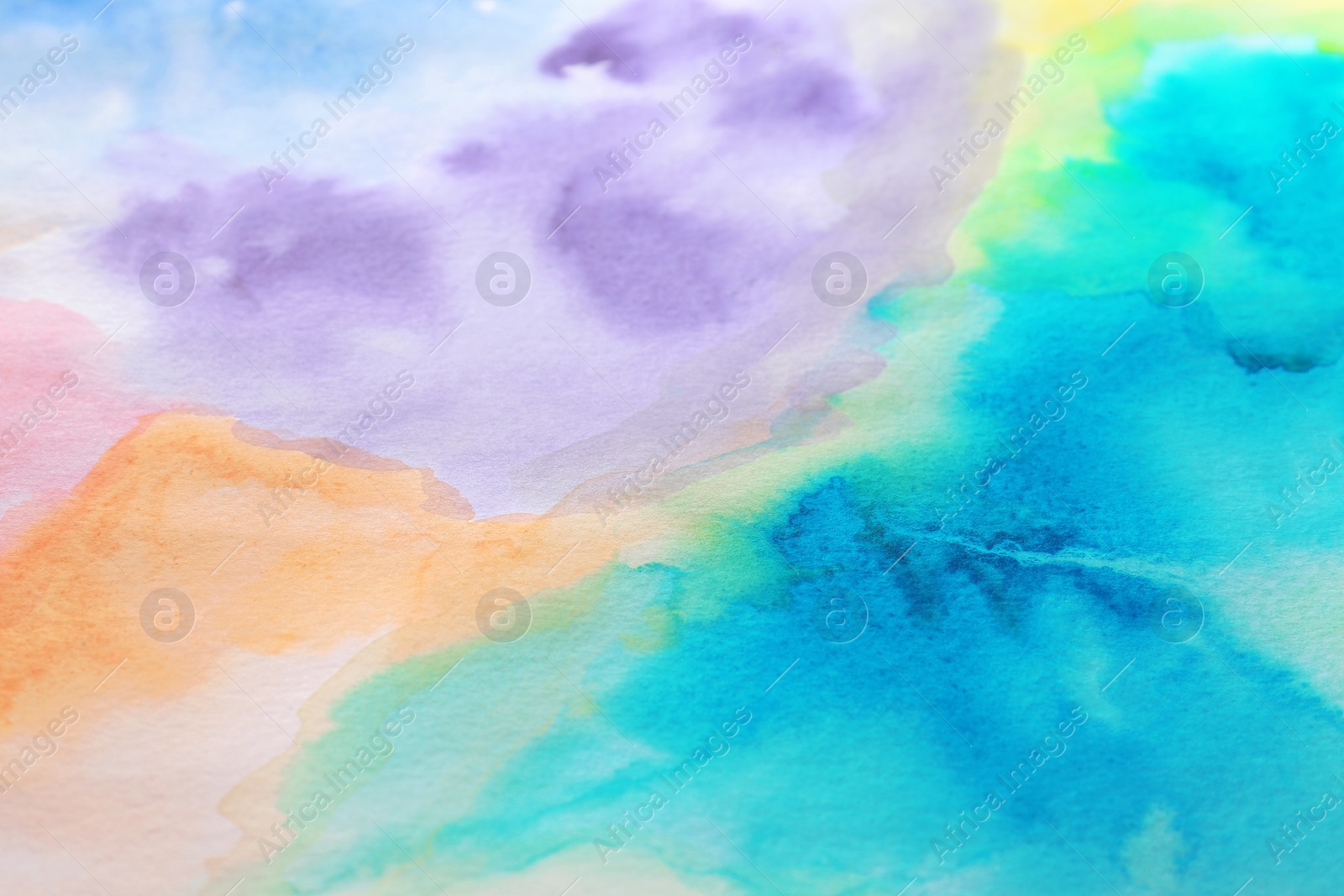 Photo of Abstract colorful background, closeup. Painted sheet of paper