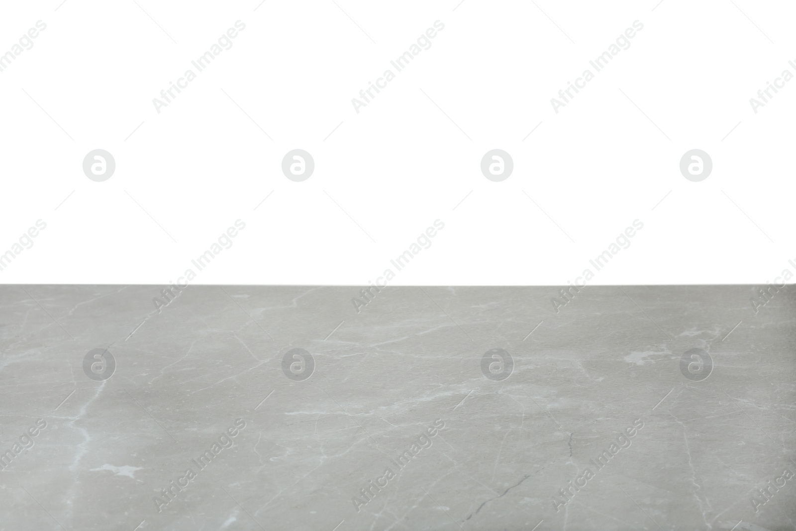 Photo of Empty stone surface against white background. Mockup for design