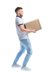 Full length portrait of young man carrying carton box on white background. Posture concept