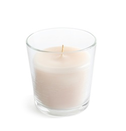 Photo of Glass with wax candle on white background