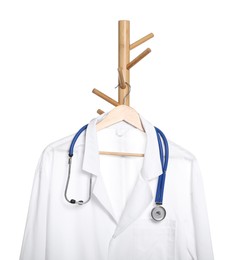 Doctor's gown and stethoscope on rack against white background. Medical uniform