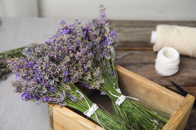 Photo of Composition with blooming lavender flowers on table