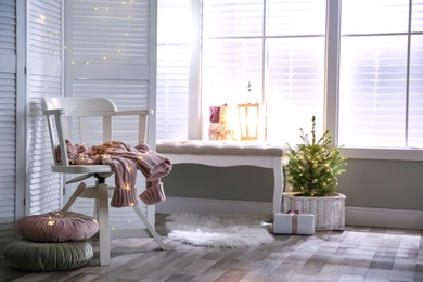 Stylish room with Christmas decorations. Festive interior design