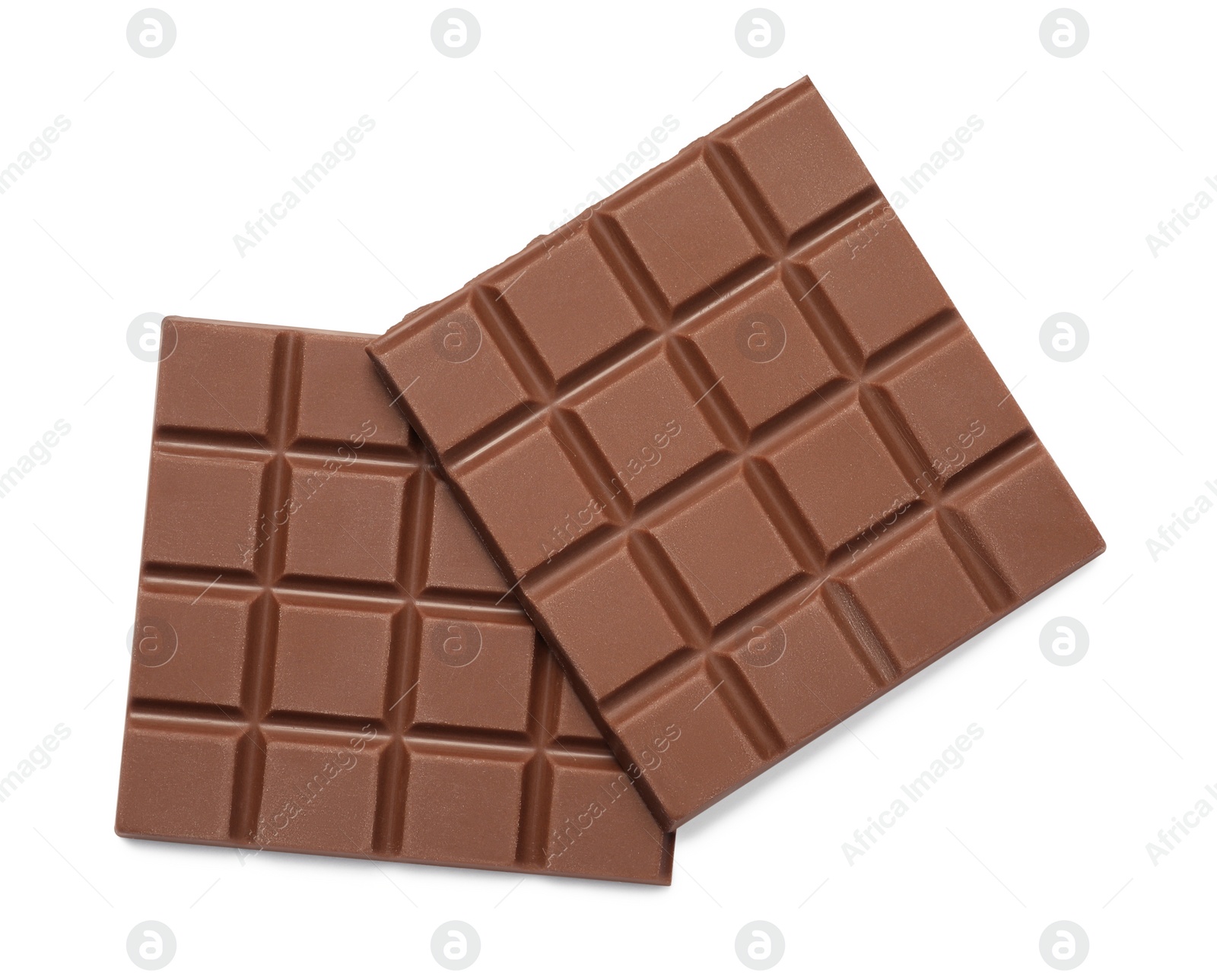Photo of Pieces of tasty milk chocolate bar isolated on white, top view
