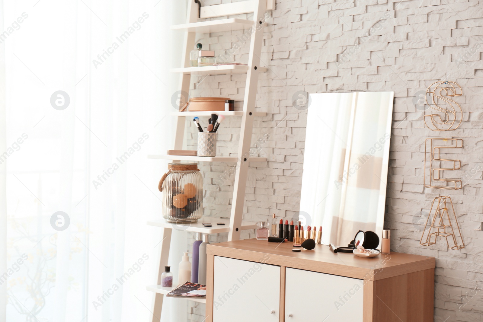 Photo of Interior of modern makeup room