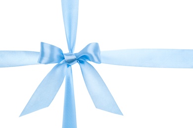 Light blue ribbon with bow on white background. Decoration for gift box