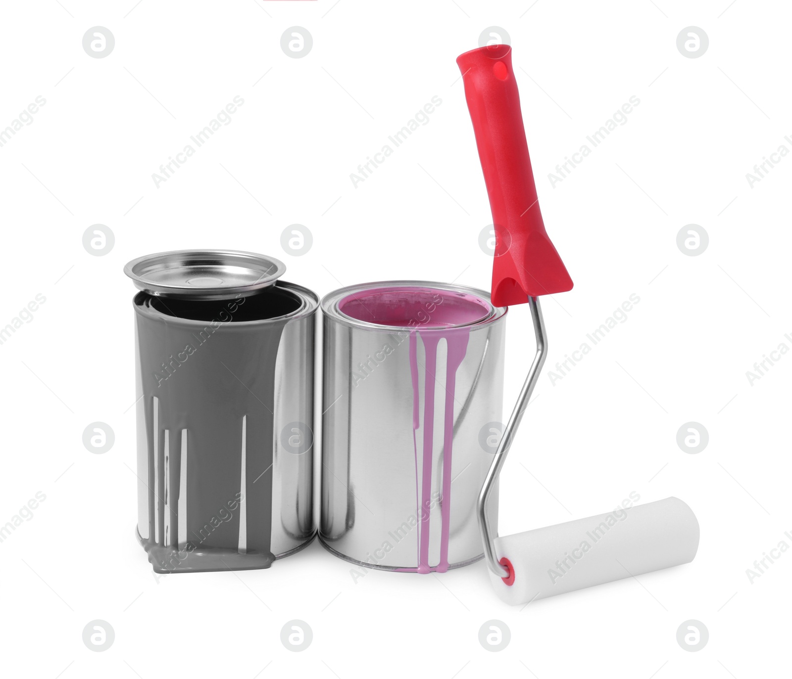 Photo of Cans of grey and pink paints and roller isolated on white