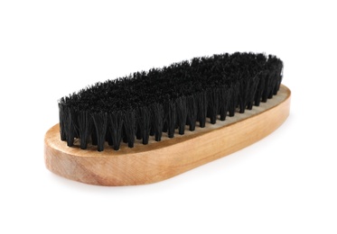 Photo of Shoe brush isolated on white. Footwear care item