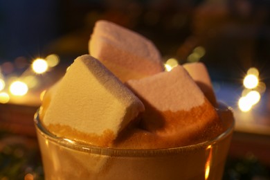 Photo of Glass of delicious hot cocoa with marshmallows, closeup