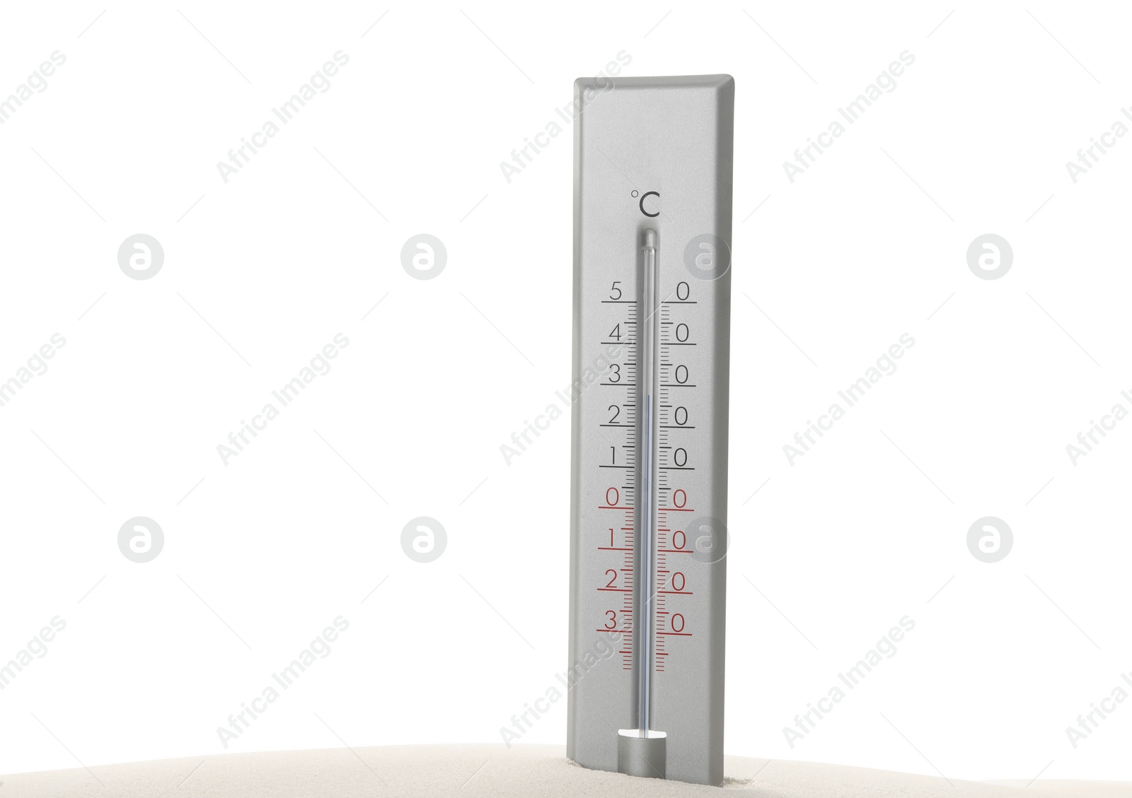 Photo of Weather thermometer in sand against white background