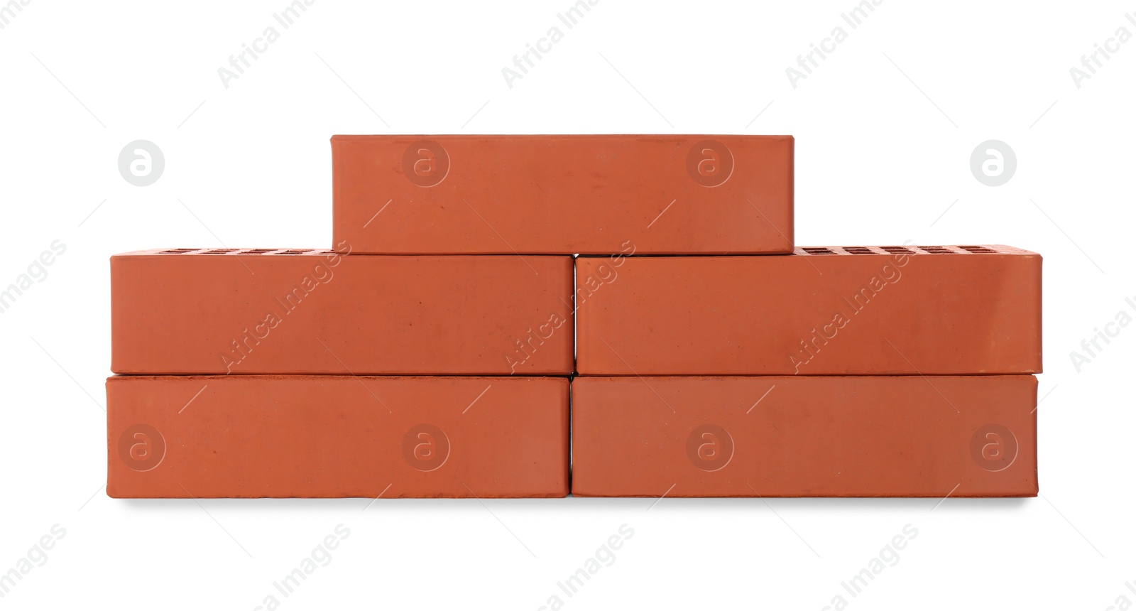 Photo of Many red bricks on white background. Building material