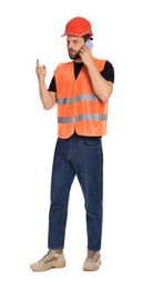 Man in reflective uniform talking on smartphone against white background