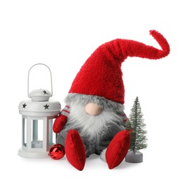 Photo of Funny Christmas gnome with tree and lantern on white background