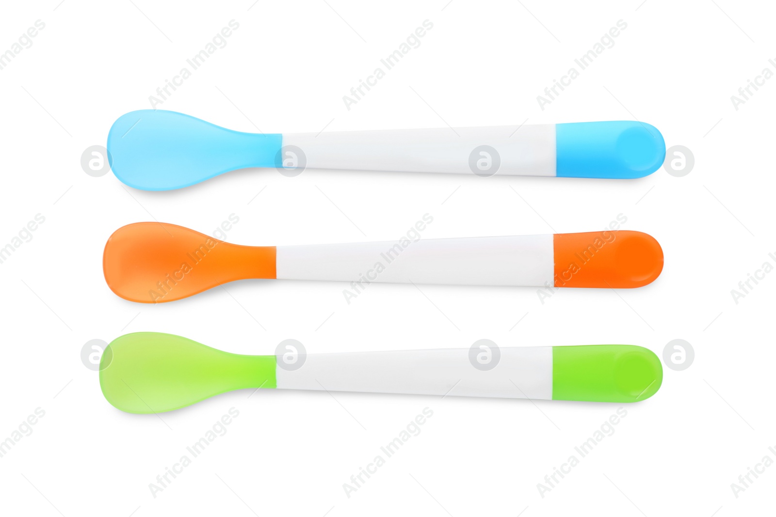 Photo of Plastic spoons isolated on white, top view. Serving baby food