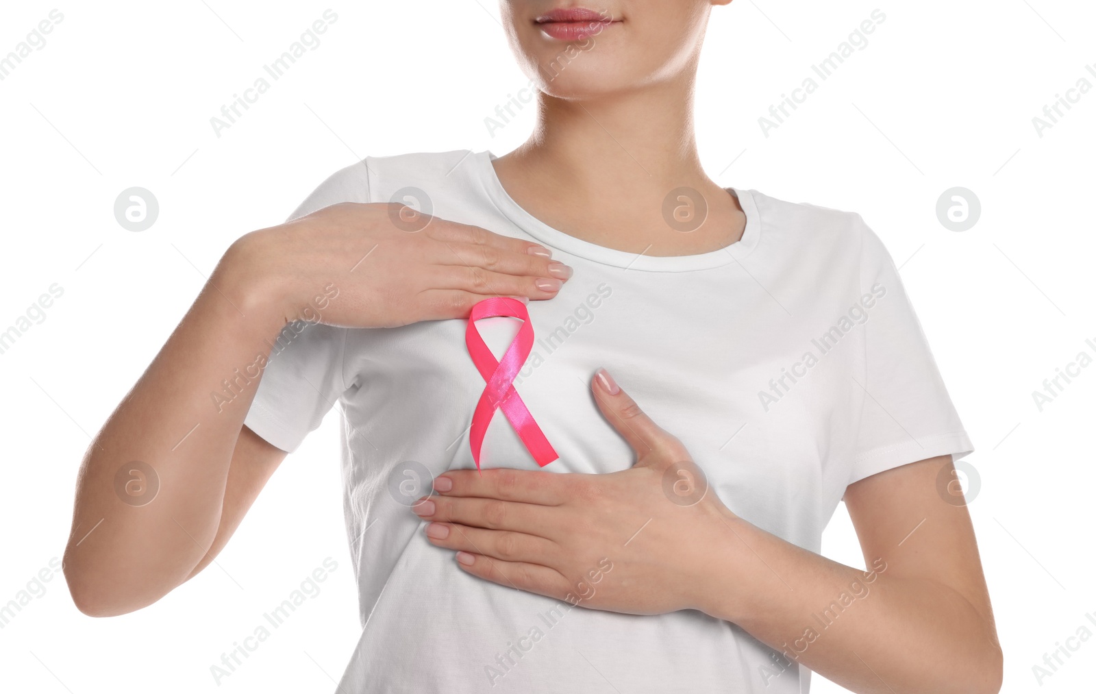 Photo of Woman with pink ribbon on white background, closeup. Breast cancer awareness