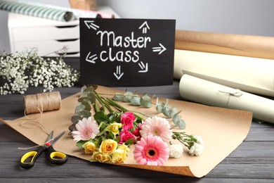 Photo of Card with words Master Class and supplies for flower arrangement on grey wooden table