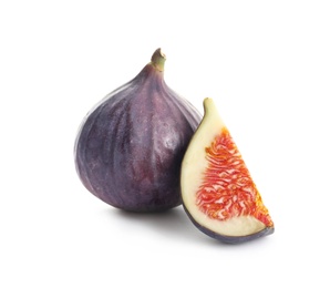 Whole and cut purple figs on white background