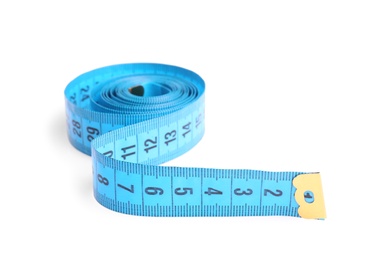 Photo of Measuring tape on white background