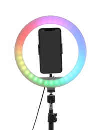 Tripod with ring light and smartphone isolated on white