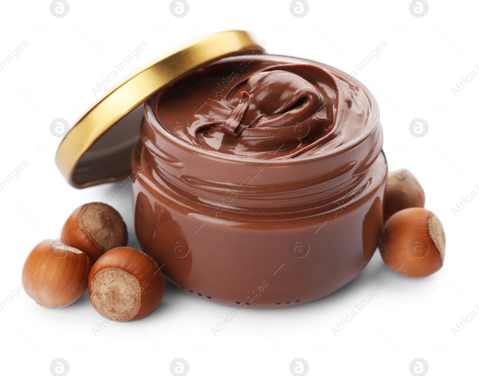 Photo of Glass jar of chocolate paste with hazelnuts on white background