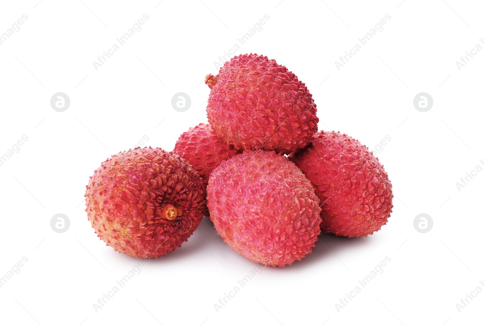 Photo of Pile of fresh ripe lychees on white background