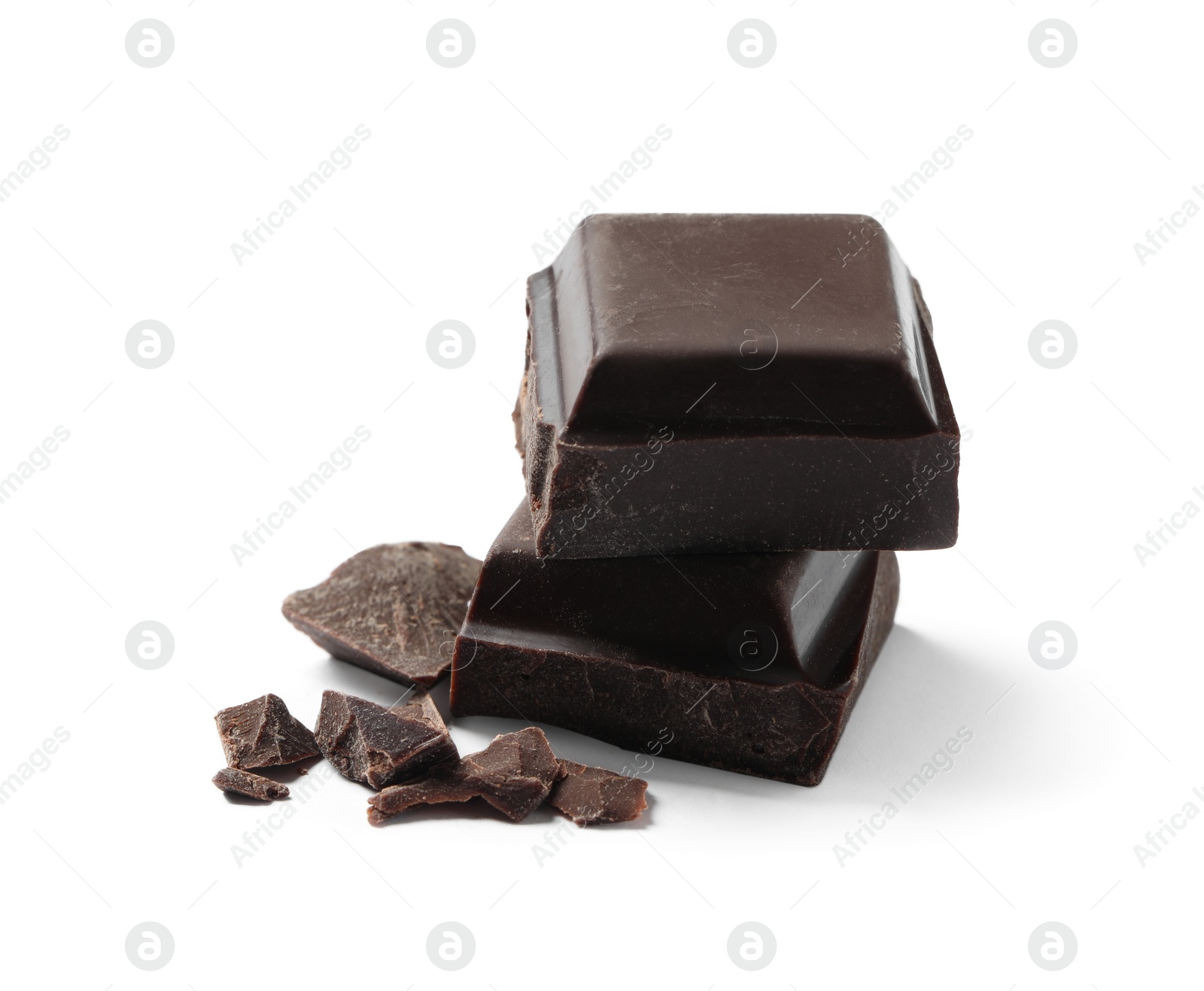 Photo of Pieces of delicious dark chocolate isolated on white