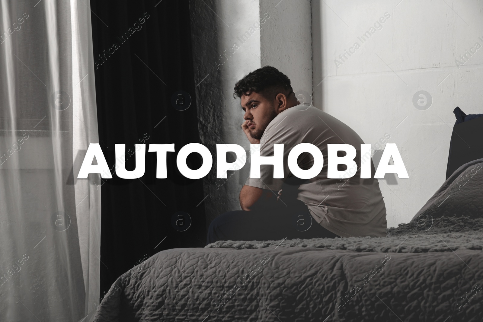 Image of Depressed overweight man sitting alone on bed at home. Autophobia - fear of isolation