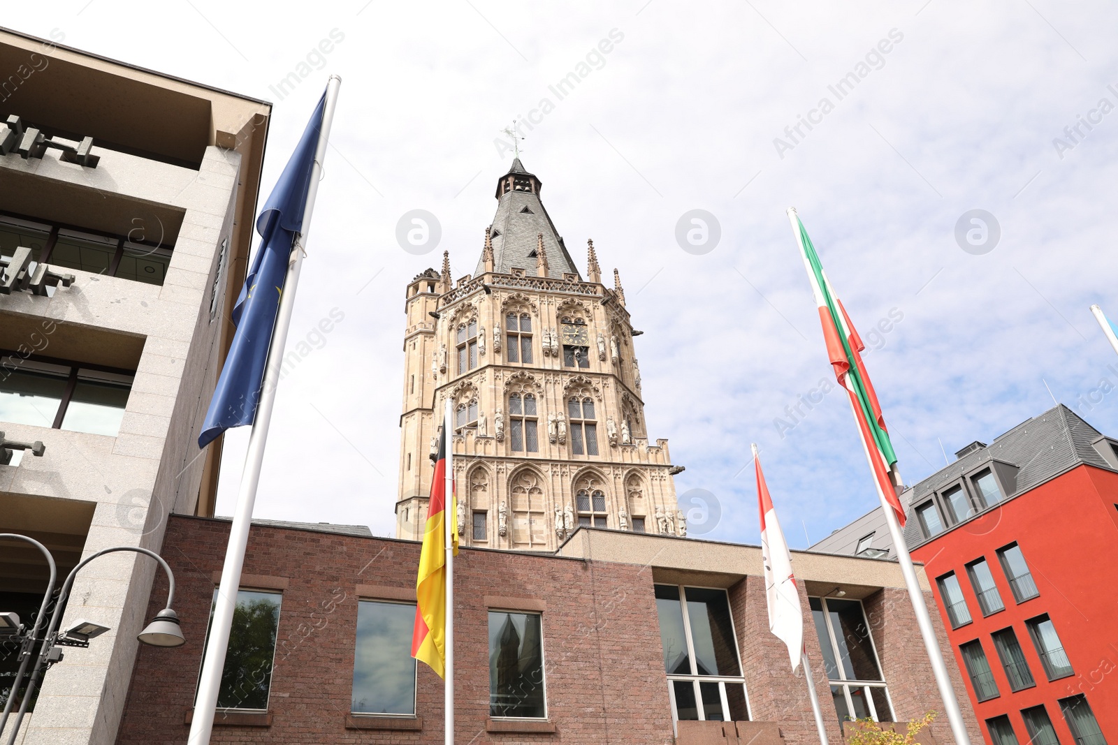 Photo of Cologne, Germany - August 28, 2022: Picturesque view of beautiful buildings on city street