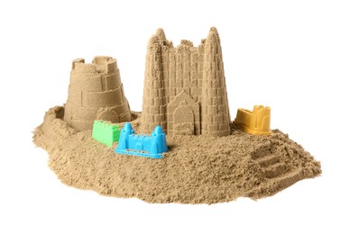 Photo of Beautiful sand castle and plastic molds isolated on white. Outdoor play
