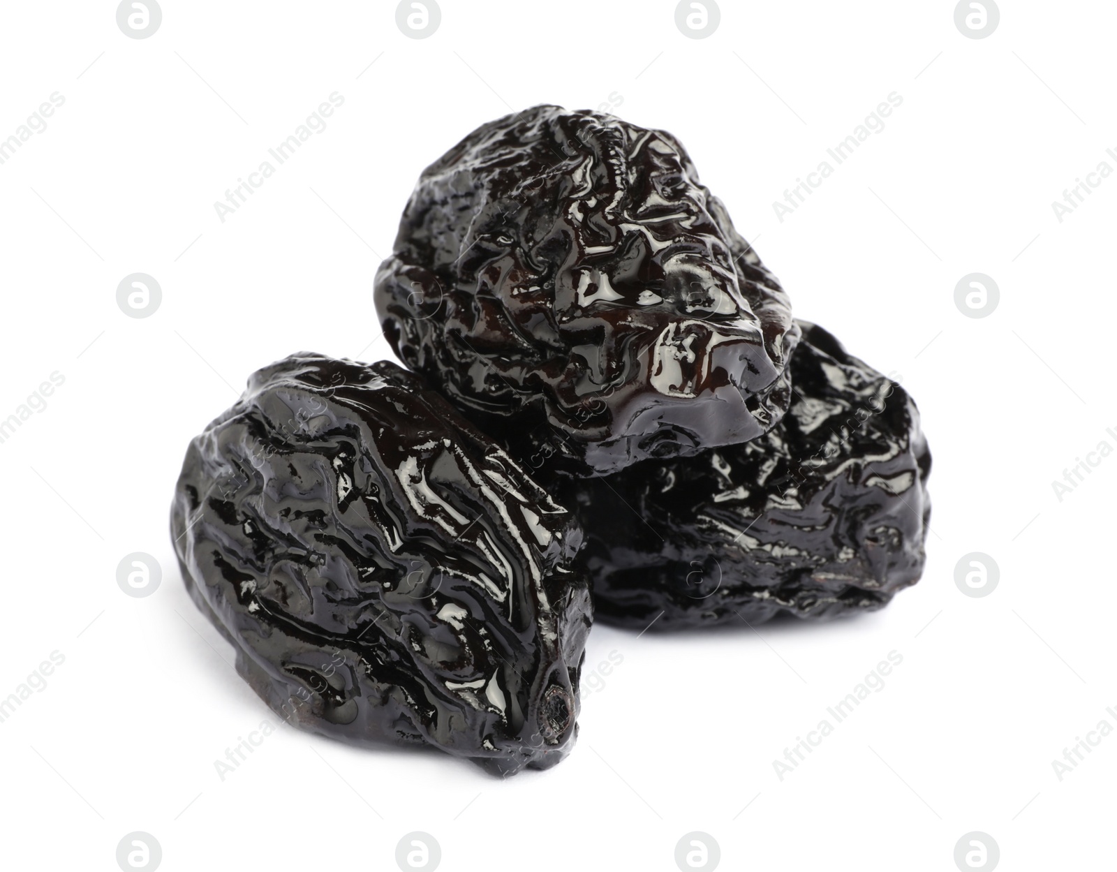 Photo of Sweet dried prunes on white background. Healthy snack