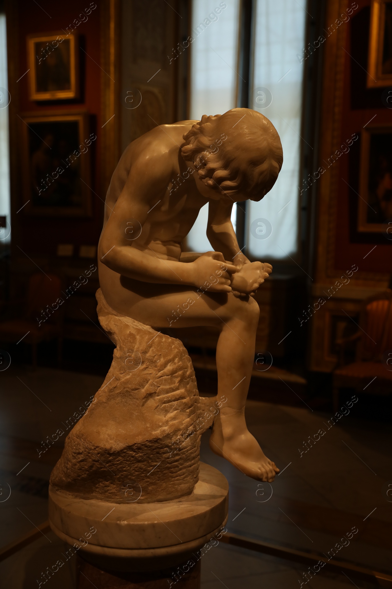 Photo of Rome, Italy - February 3, 2024: Statue of Boy with Thorn in Borghese Gallery