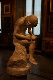 Photo of Rome, Italy - February 3, 2024: Statue of Boy with Thorn in Borghese Gallery