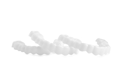 Photo of Dental mouth guards on white background. Bite correction